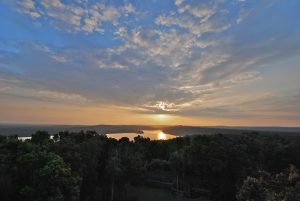 Maya-trails-guatemala-Yaxha-temple-sunset-lagoon